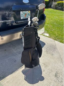 New gold bag only driver included plus balls