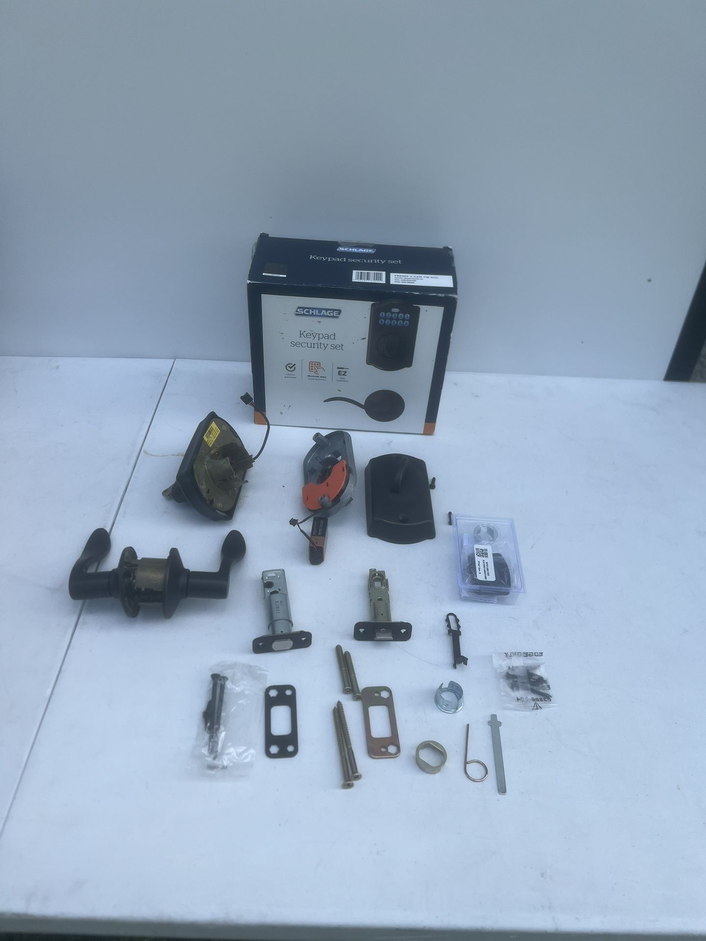 Schlage EZ Install Keypad Security Set FBE365 V CAM 716 ACC Aged Bronze. 1 key included. READ appears to partially used because many of the hardware l