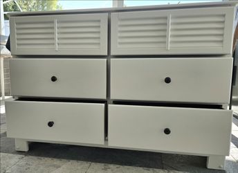 Cute wood dresser.