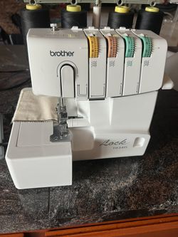 Sewing: Brother Sewing  lock 1034D Thread Serger machine 