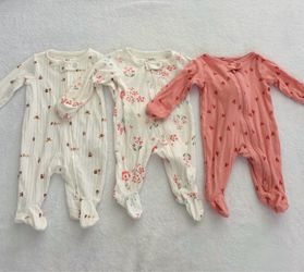 Newborn Carter’s footed onesies-3 pieces