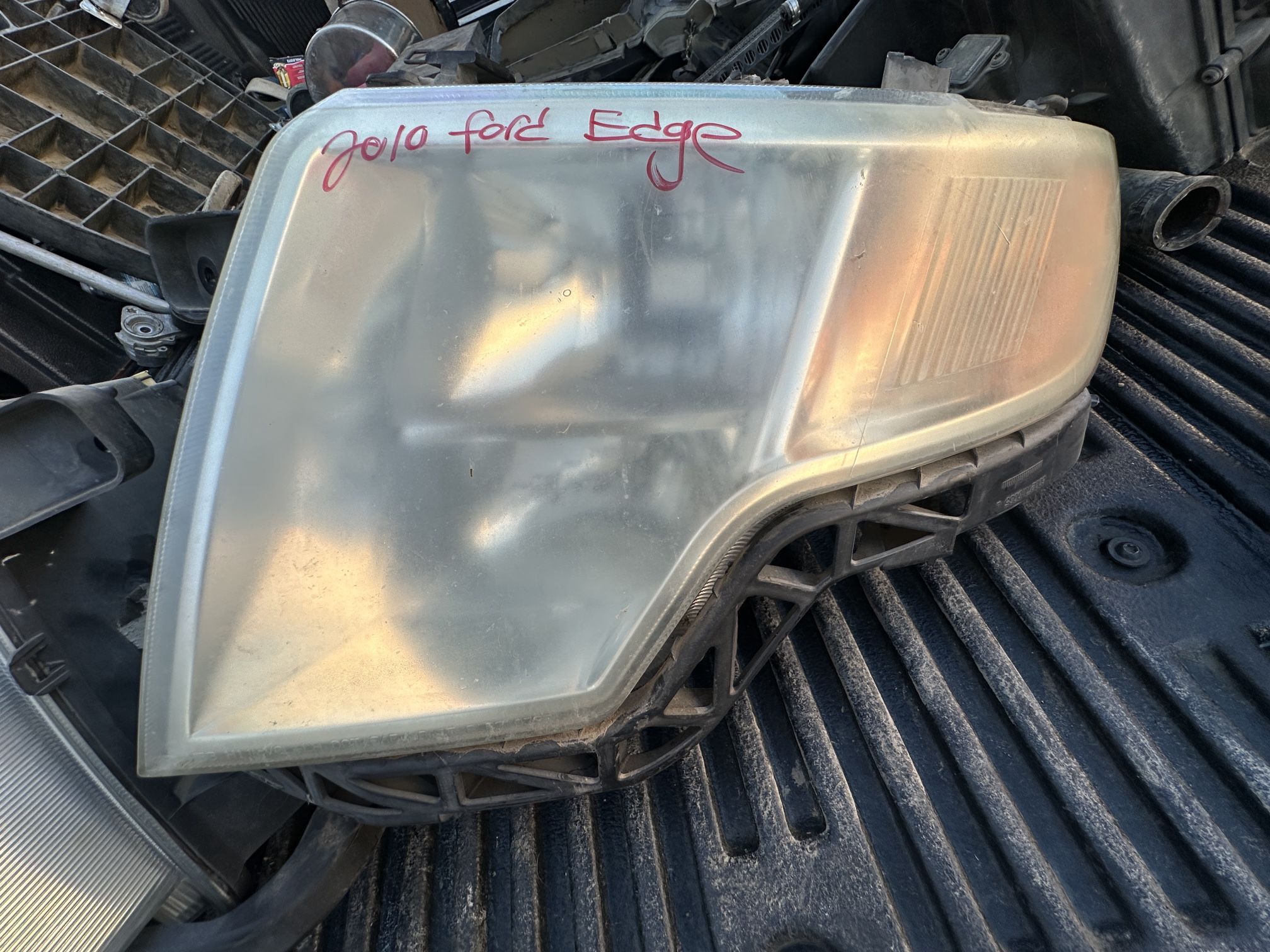 Headlights 2010 Ford Edge