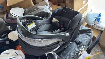 Graco Premier SnugRide SnugFit XT Infant Car Seat, Anti Rebound Bar for Extra Safety, SnugLock Easy Install, Privacy Drape, Storage Pocket, Baby Car S