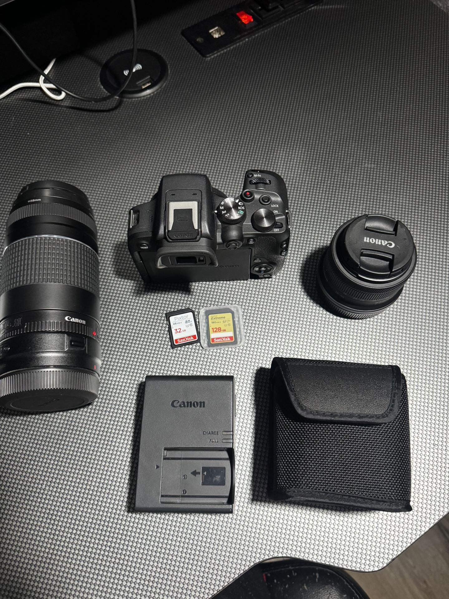 Canon R10 With 18-45MM F4.5-6.3 / 75-300MM F4 / Battery Charger/ 125 GB and 32 GB MEMORY CARS