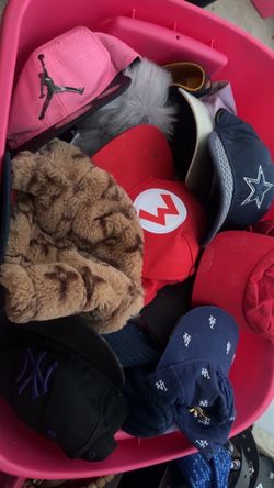 Bin of hats and beanies around 43