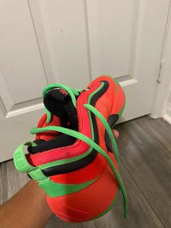 Red and green adida hoop shoe