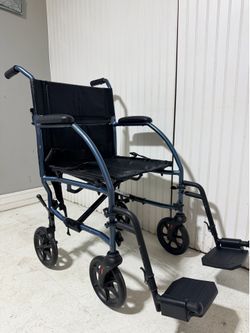 Transport wheelchair