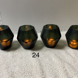 Set of (4) Gorgeous Eichholtz Candle/Tea light Holders By Okhto L.  Modern, elegant and refined, these candle holders form a very chic and modern set 
