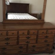 Antique dresser with mirror and matching side table