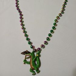 BRAND NEW ALLIGATOR NECKLACE, HOLDING AN UMBRELLA 