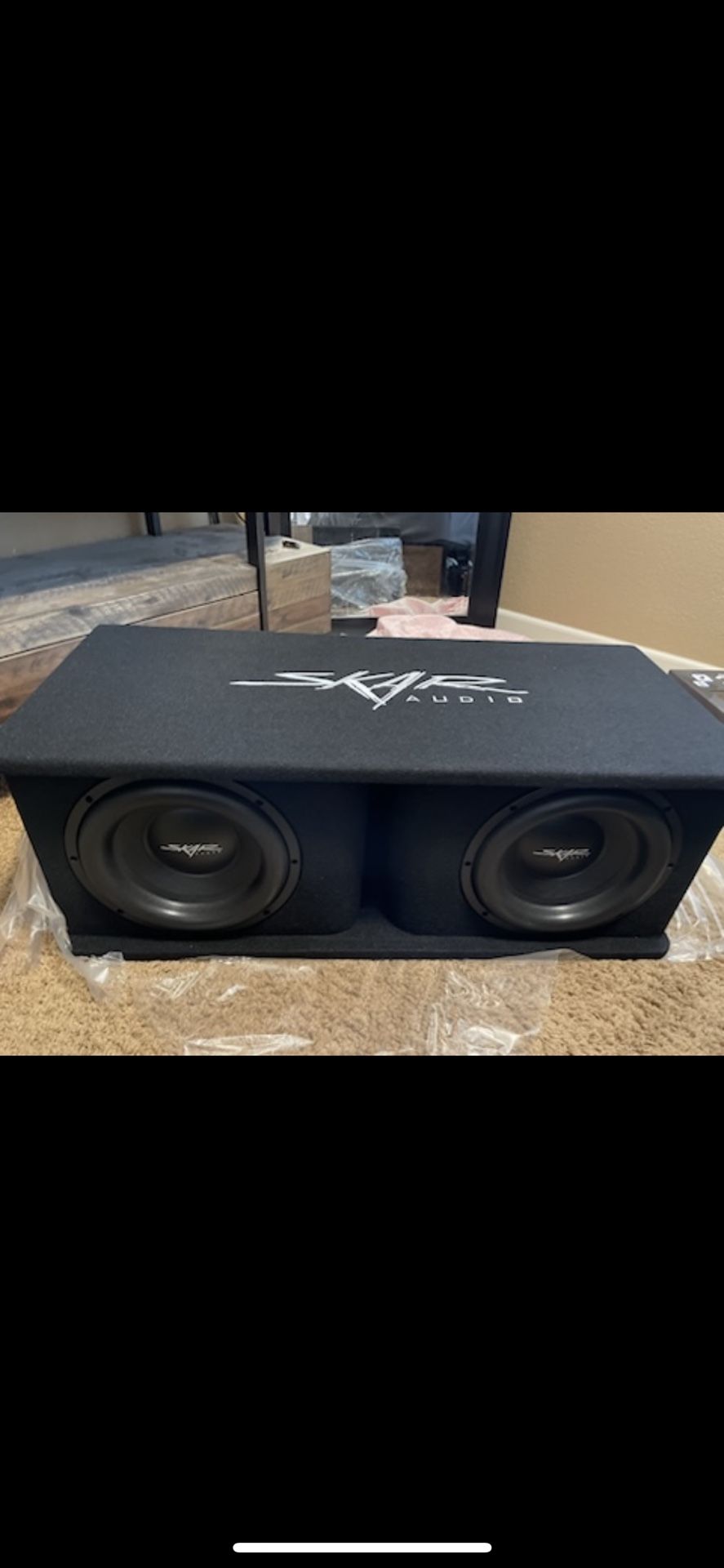 Two 12s Skar Audio Speakers