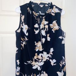 black sleeveless blouse with flowers