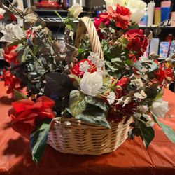 Flowers is a wicker basket 