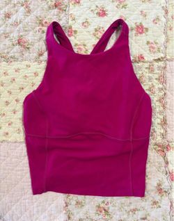 Hot pink lululemon top and 3 pairs of lululemon leggings