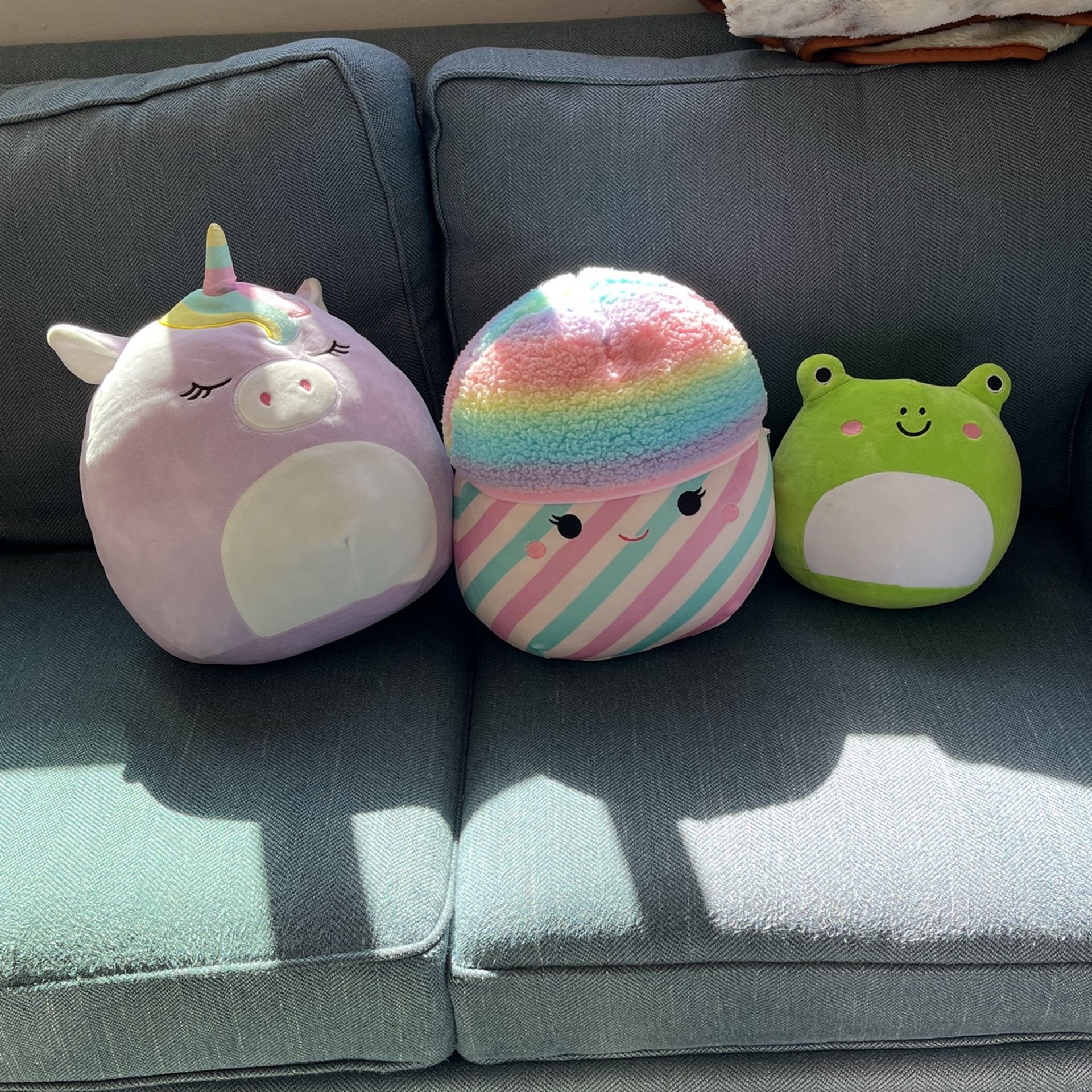 Stuffy Madness.  Three medium sized stuffed animals.