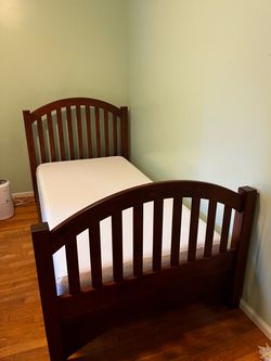 Dark wood Bedframe + brand new mattress