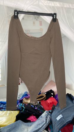 Body suit never (worn small )