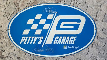 Rare DUAL SIGNED Petty’s Garage Metal Sign