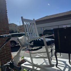 White wooden porch rocking chair