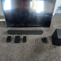 65 samsung smart tv and sound bar with wireless speakers 