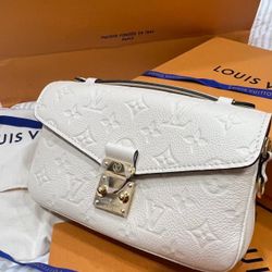 White cream-colored letter series backpack with dual shoulder straps