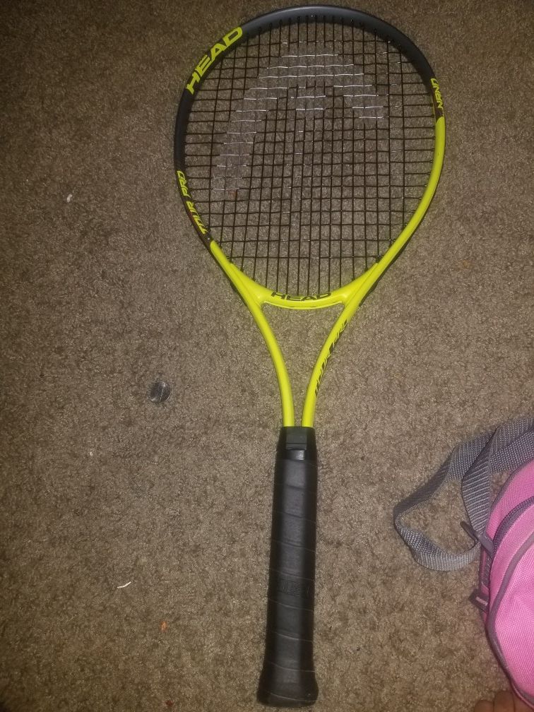 Tennis racket plus tennis balls and bag