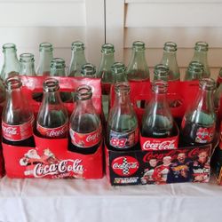33 VINTAGE 1996 EMPTY COCA COLA BOTTLES