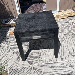 Small Black Tables And Black Stools 