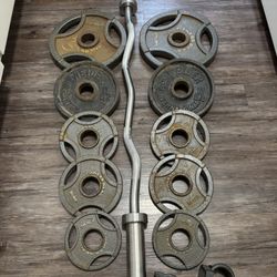 Solid Curl Bar With Brass Bushings And Olympic Weights 2x25, 2x11, 4x5 And 2x2.5 Lbs With Collars 