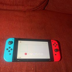 Selling Nintendo switch with joy cons + tablet
