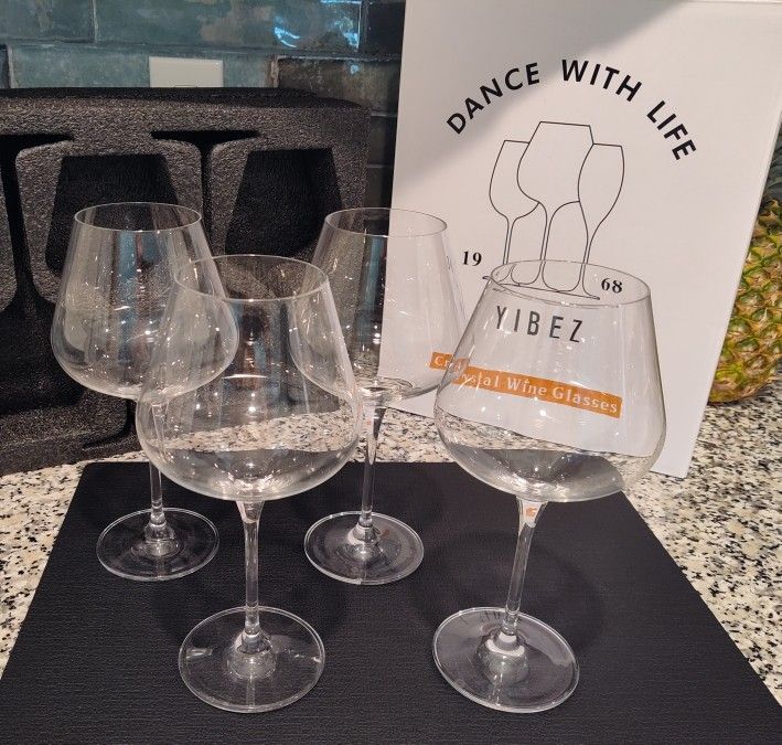 Crystal wine glasses in original box with packaging. Like new