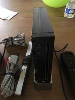 Black Nintendo Wii with controller and nunchuck