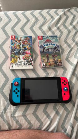 Nintendo switch (extra battery) and games