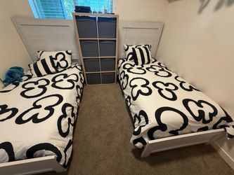 Two twin bed frames in mint condition