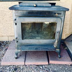 WOOD BURNING CAST IRON STOVE FIRE PLACE