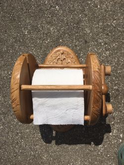 Fishing reel toilet paper holder