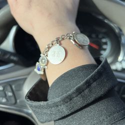 Sterling Charm Bracelet With 14 Charms 