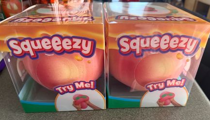 New Viral Squeeeeze Peach Squish Toy $10 each