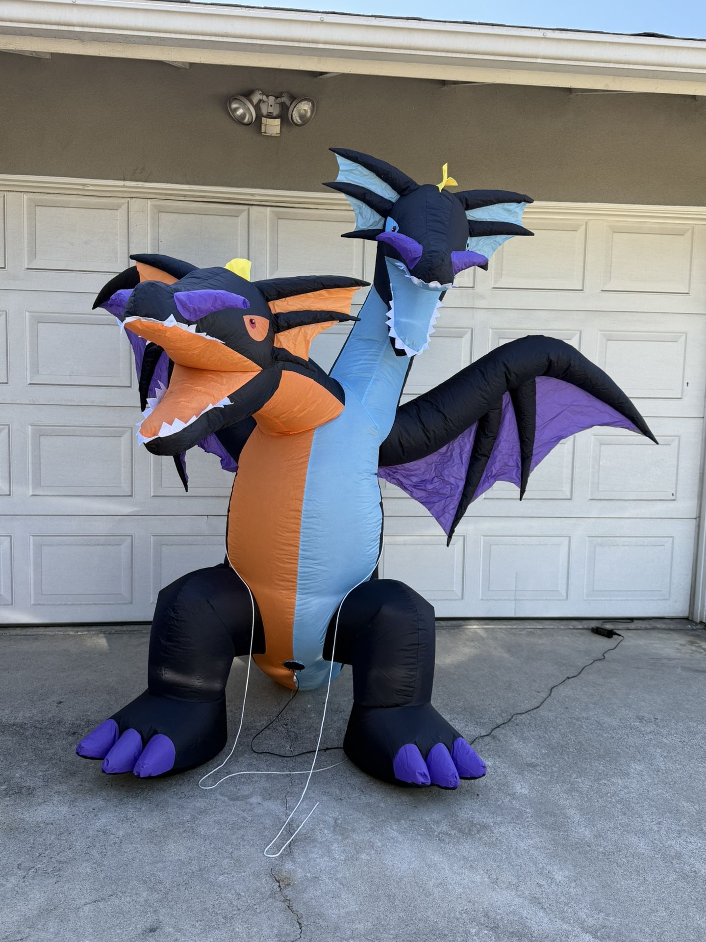 Two Headed blow Up Halloween dragon Outside