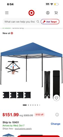 Blue Pop-Up Canopy Tent with stakes and weights.
