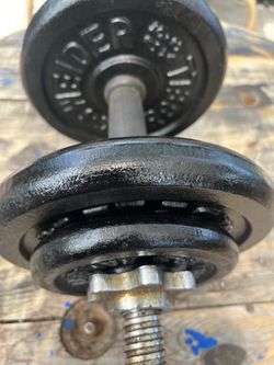 Barbell weight plate  two of 10 pounds each and two of 3 pounds each
