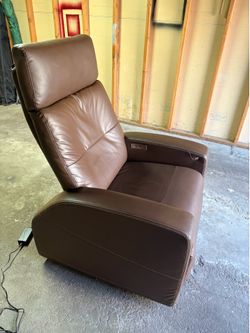 Motorized recliner with lift assist