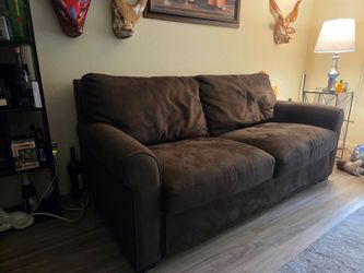 Dark brown couch sofa