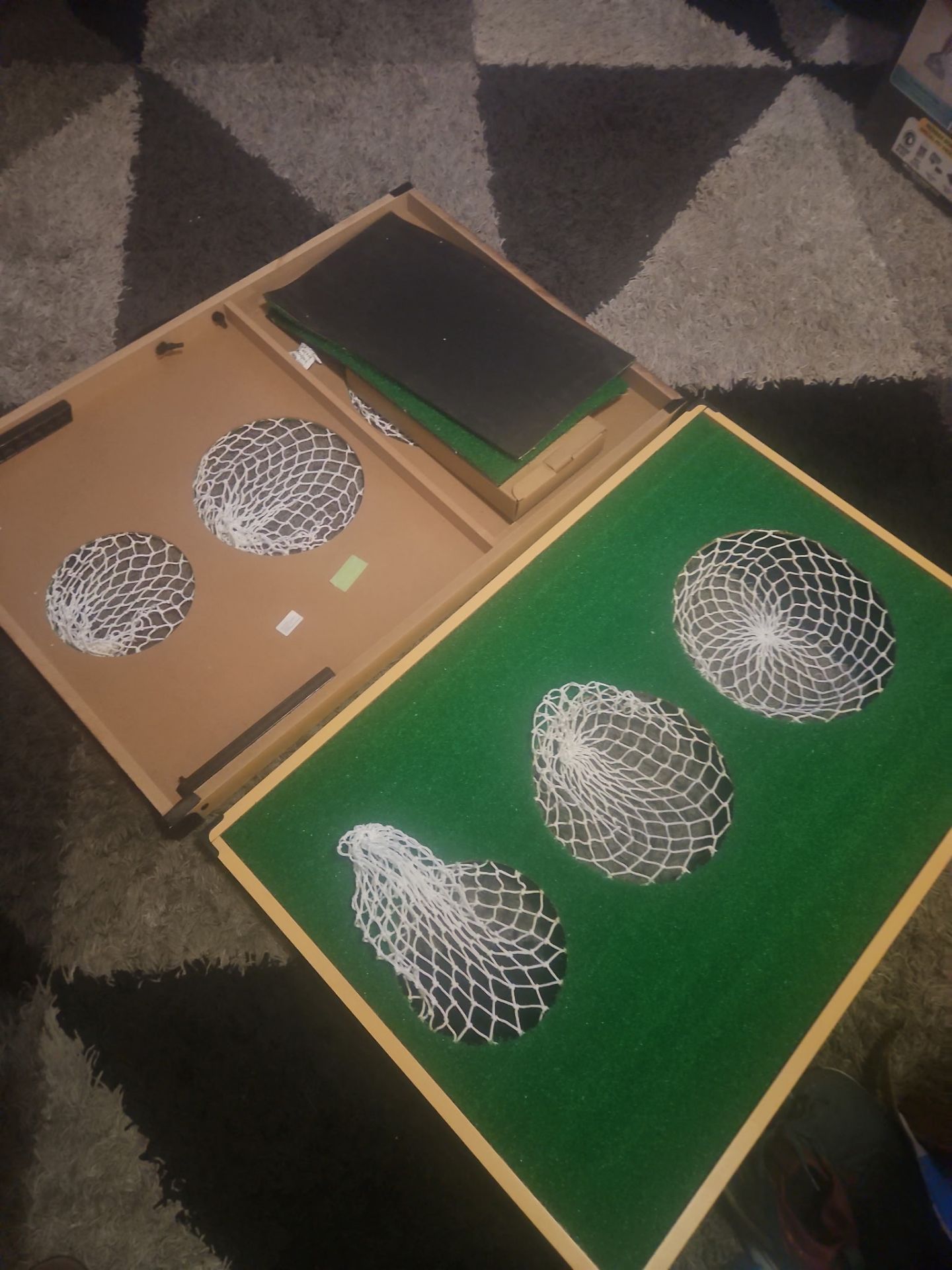 backyard game that combines elements of golf and cornhole.