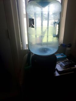 Water dispencer and 5 gallon jug
