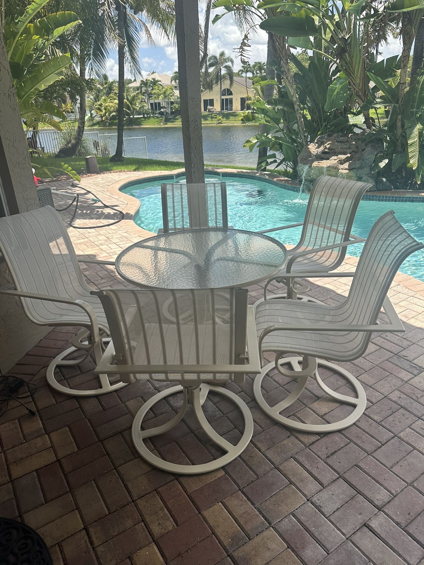 Outdoor Patio Table With Swivel Chairs