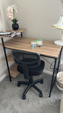 Desk, chair, lamp and flower