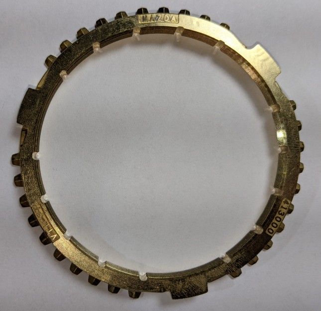 Toyota/Scion 33368-WB001 or Mazda F602-17-265 New/OEM
Synchronizer Ring( See Description)