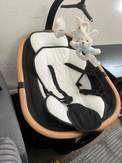 Momcozy M5 and baby Swing