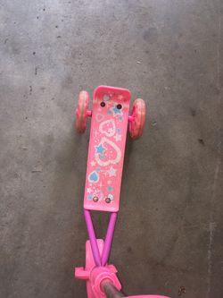 Kids pink scooter see pictures some rust and sticker pealed